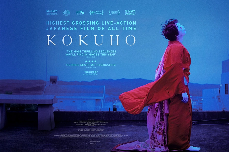 Official poster for the Japanese film Kokuho showing a kabuki performer in a flowing red kimono under blue neon lighting