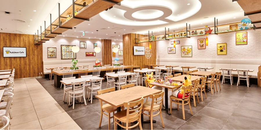 Interior of Pokémon Cafe in Osaka with themed décor, Pikachu displays, and family-friendly seating