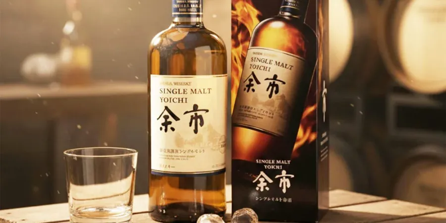 Nikka Single Malt Yoichi Japanese whisky bottle and presentation box with a whisky glass and ice