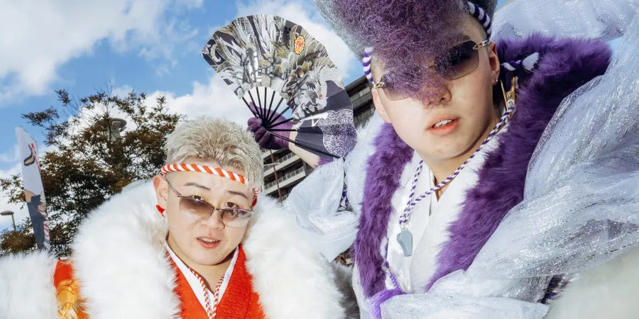 Young people in elaborate traditional-inspired outfits celebrating Coming-of-Age Day in Kitakyushu, Japan