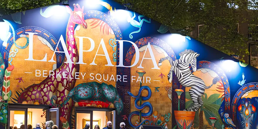 LAPADA Berkeley Square Fair entrance in London featuring colourful animal artwork and illuminated event signage