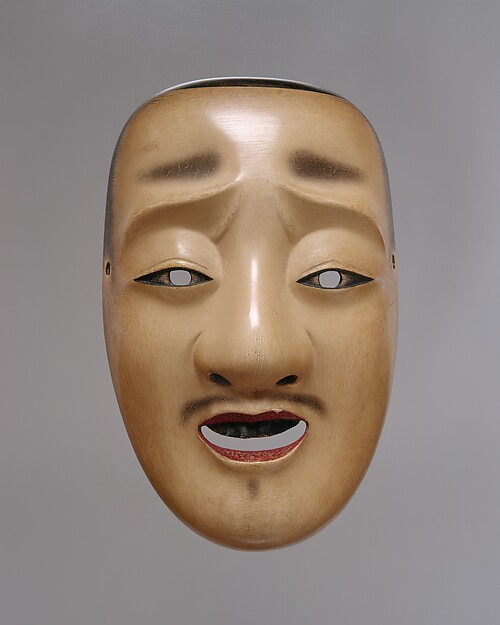 A Chujo Noh mask, the face of an aristocratic military commander, carved in wood in the eighteenth century by Genkyu Michinaga.