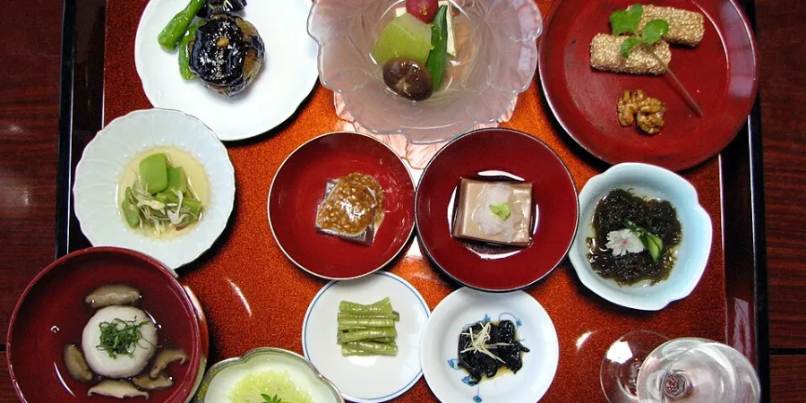 Shojin ryori Japanese Buddhist vegetarian meal served as an assortment of small dishes on lacquerware