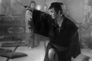 Tatsuya Nakadai as Ryunosuke Tsukue, blood streaked and mid cut, in the closing massacre of The Sword of Doom.