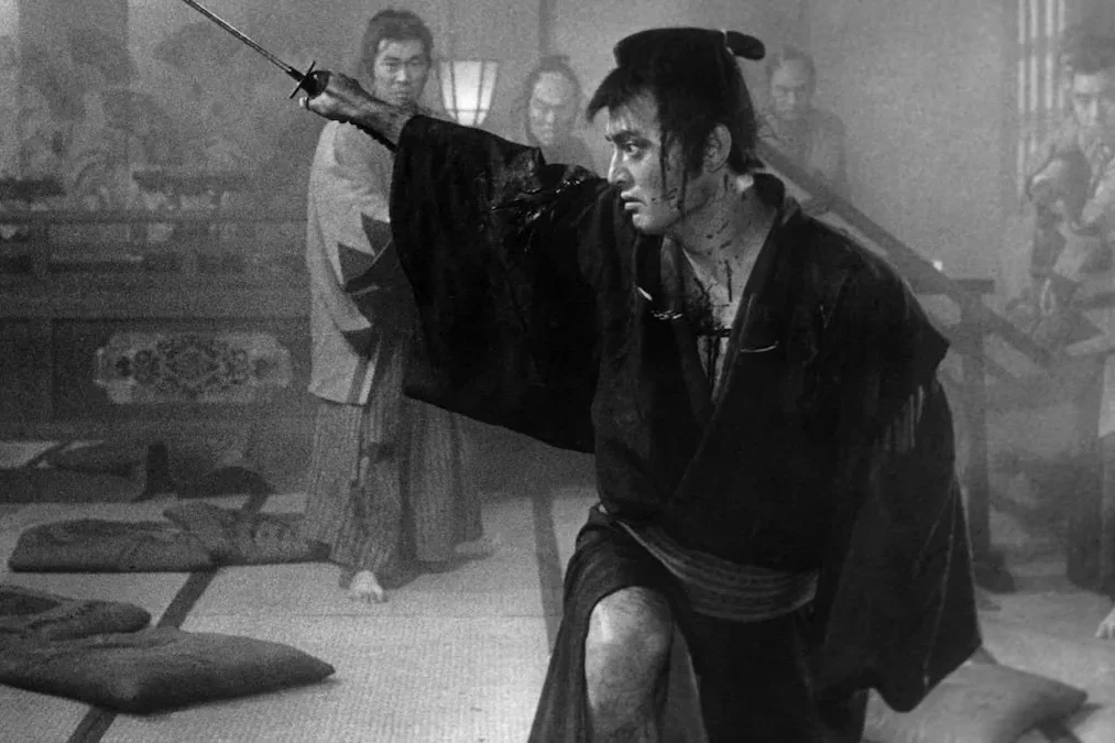 Tatsuya Nakadai as Ryunosuke Tsukue, blood streaked and mid cut, in the closing massacre of The Sword of Doom.