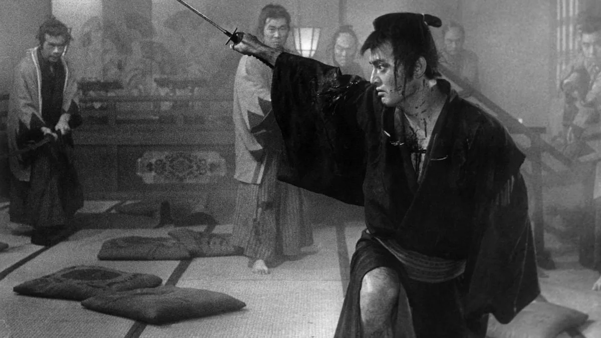 Tatsuya Nakadai as Ryunosuke Tsukue, blood streaked and mid cut, in the closing massacre of The Sword of Doom.