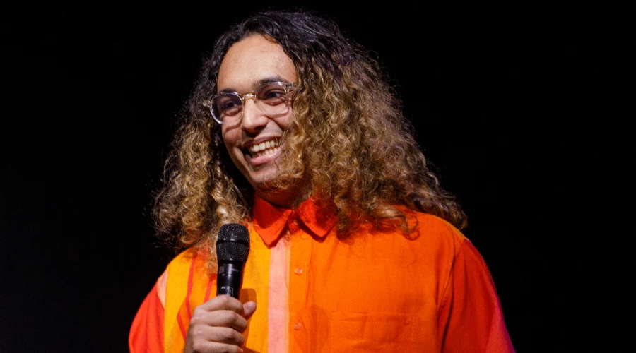 RepresentAsian founder Ben Armstrong on stage at the Lyric Theatre in 2025
