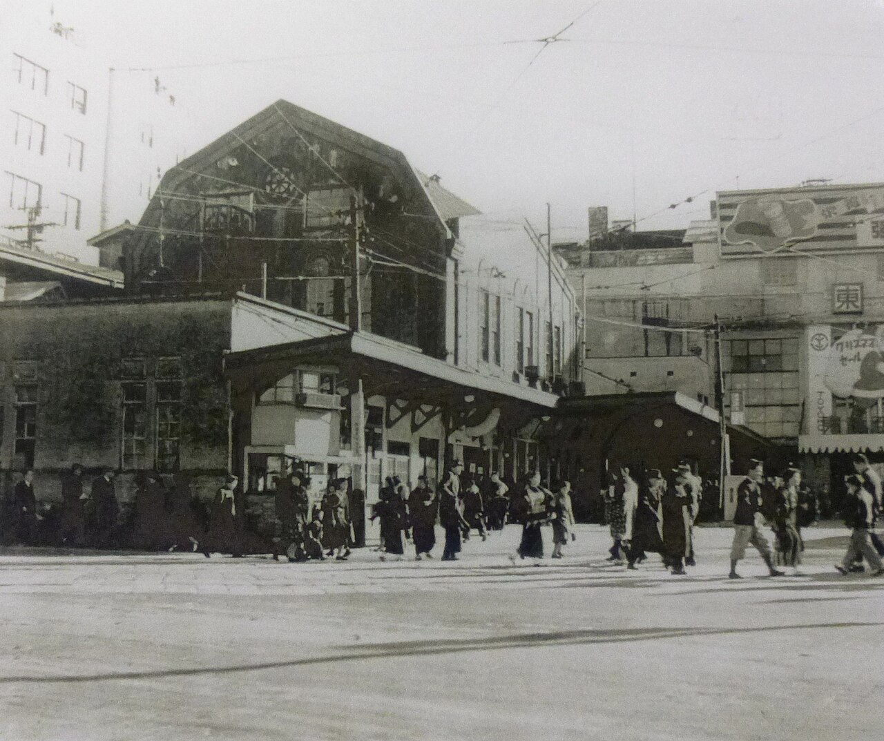 Black and white photograph of the front of Shibuya Station in 1951