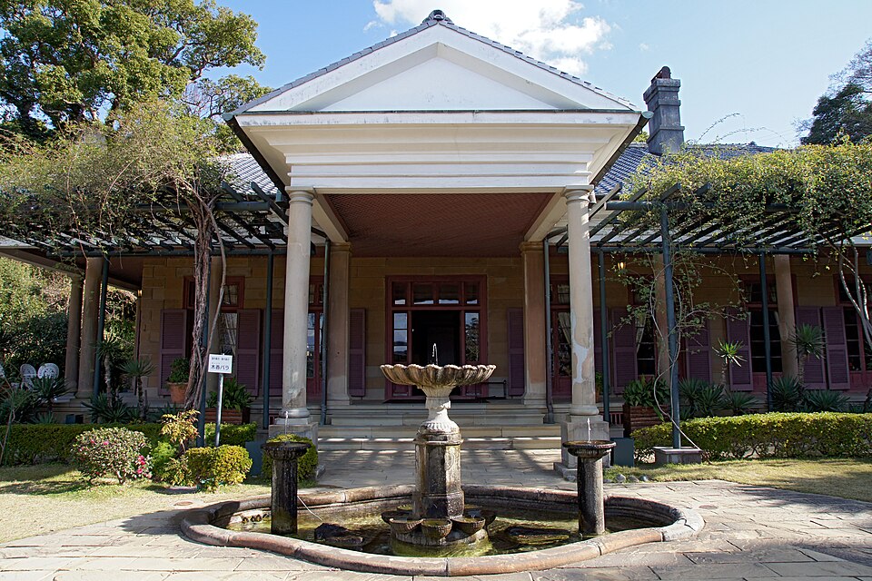 The columned stone porch and fountain of the Former Alt House, a 19th century Western style residence in Glover Garden, Nagasaki