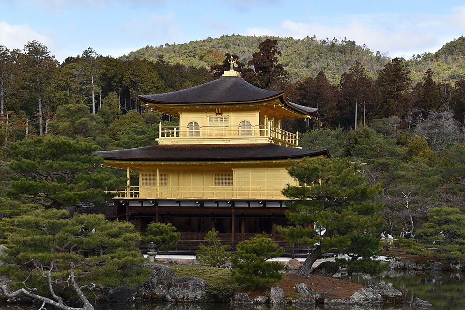 The Golden Pavilion at Kinkaku-ji in Kyoto, its gold leaf upper floors set among pine trees