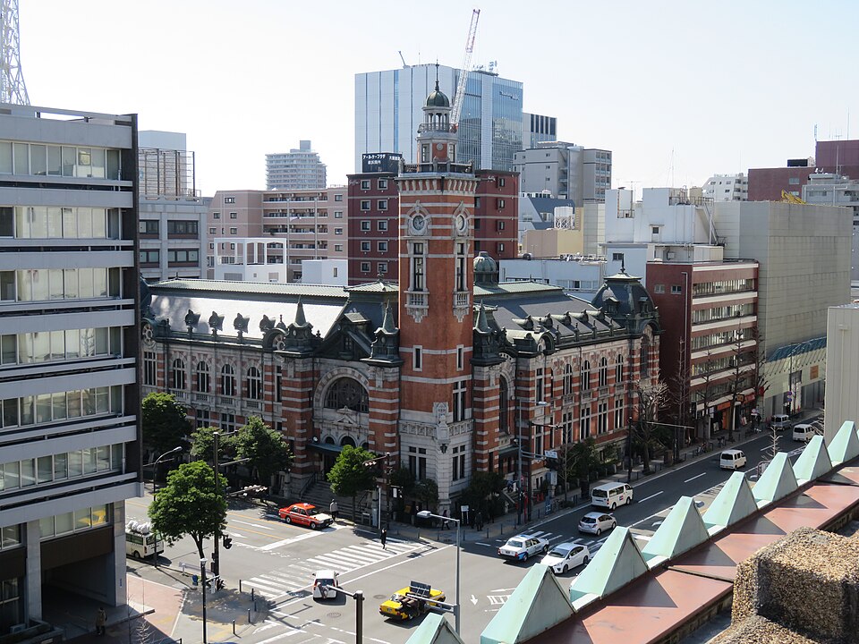 The red brick Yokohama Port Opening Memorial Hall and its clock tower seen from above