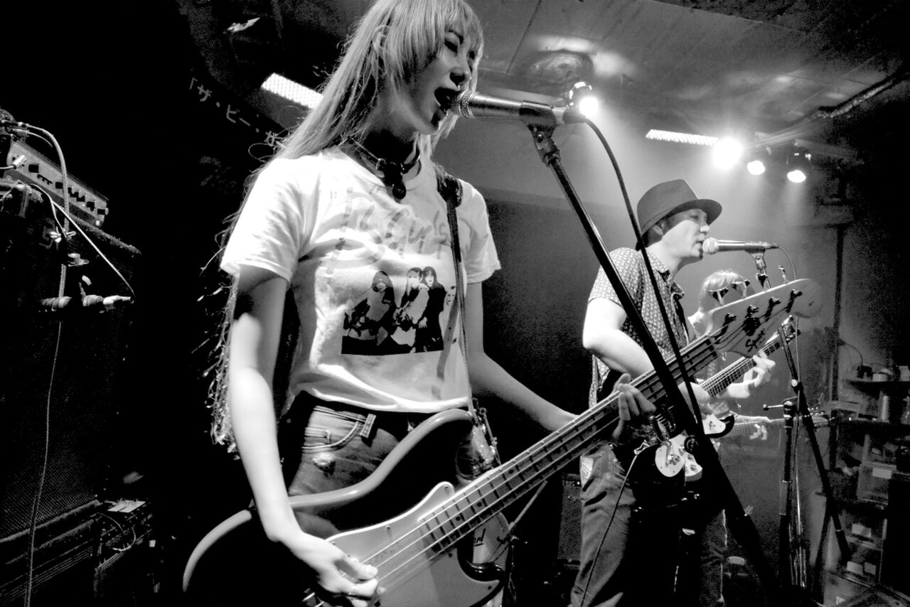 Black and white photo of the band Flashlights playing on stage at Shimokitazawa Three