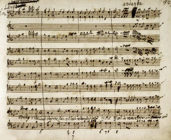 A page of Handel's handwritten score for Worthy is the Lamb, the final chorus of Messiah