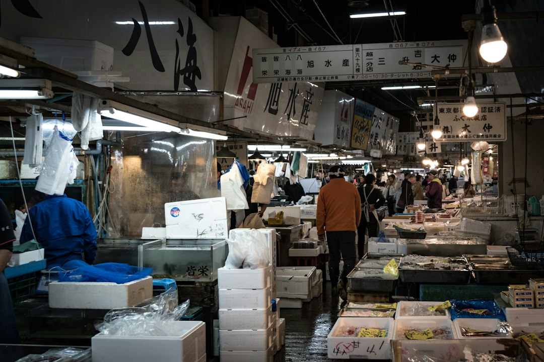 Wholesale stalls and polystyrene fish boxes inside the old Tsukiji fish market in Tokyo