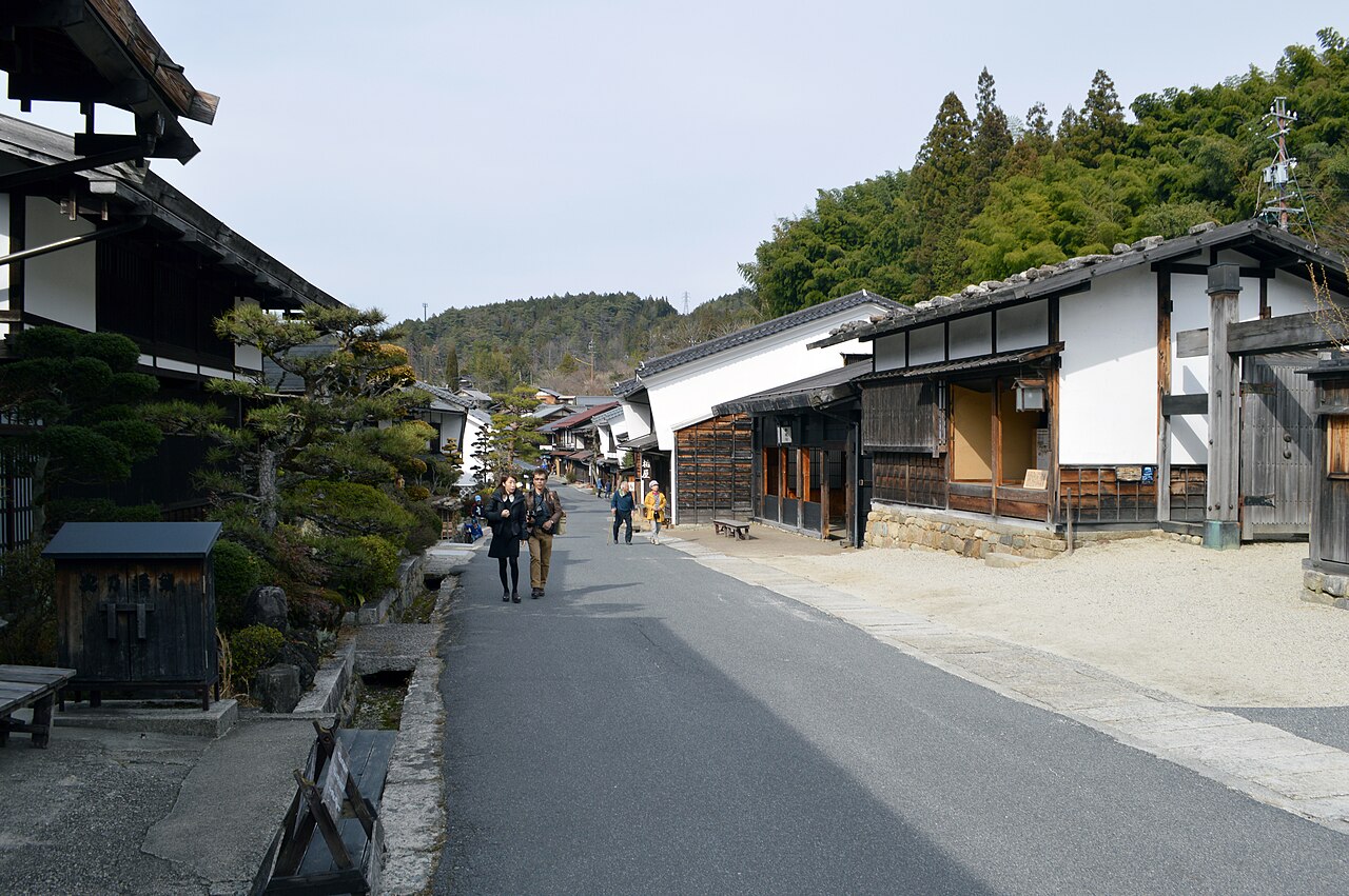 Wooden Edo period buildings lining the Nakasendo road through the post town of Tsumago-juku